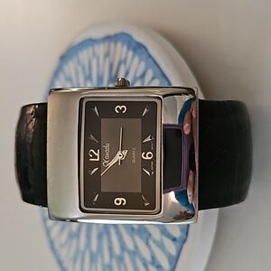Black bangle watch